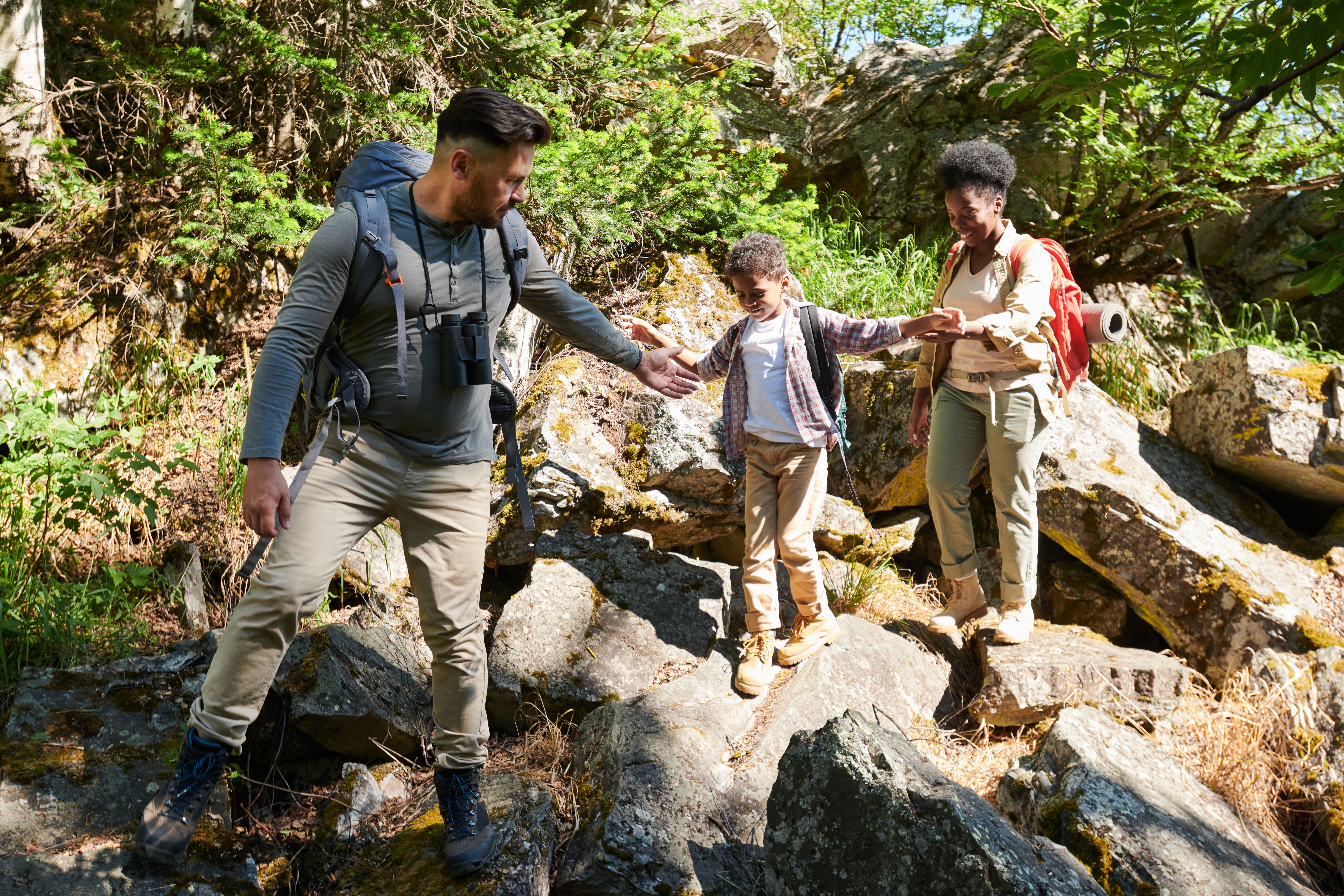 a family hiking and demonstrating rv leave no trace rules for kids